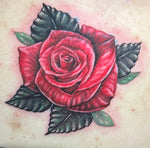 Red rose color tattoo