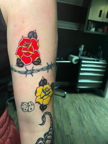 Traditional roses tattoo