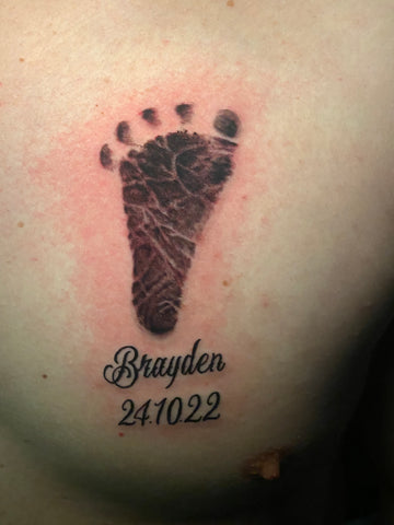 baby footprint tattoos on shoulder