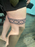 Leg band tattoo