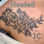 Floral Tattoo On The Clavicle With Black Line Work And Shading