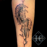 Inspirational Tattoo With A Lion And An Elephant On The Forearm In Black And Gray Tatuaje Inspirador Con Un León Y Un Elefante En El Antebrazo Con Tinta Negra Y Gris<br>